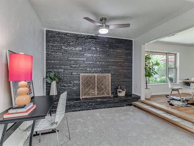 1738 Westchester Dr, Oklahoma City, OK 73120 - carpeted home office with a fireplace and a ceiling fan
