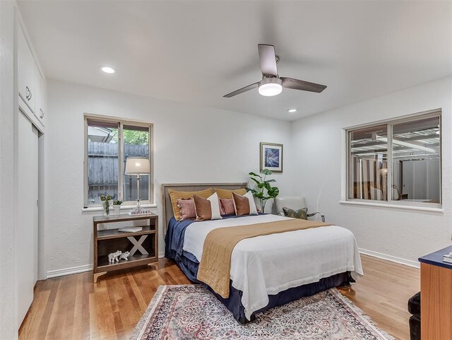 1738 Westchester Dr, Oklahoma City, OK 73120 - bedroom featuring wood finished floors, baseboards, ceiling fan, and recessed lighting