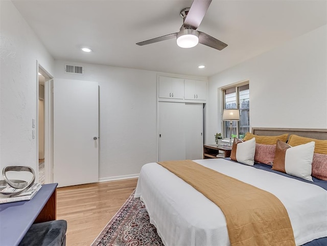 1738 Westchester Dr, Oklahoma City, OK 73120 - bedroom featuring light wood-style flooring, a ceiling fan, recessed lighting, and a closet