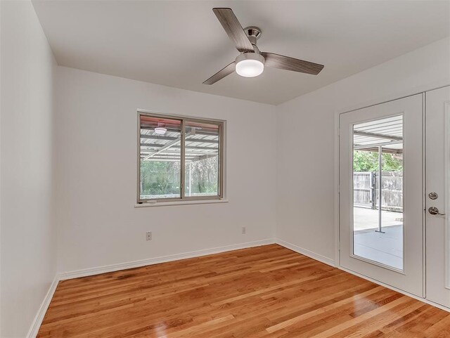1738 Westchester Dr, Oklahoma City, OK 73120 - empty room with light wood-style flooring, baseboards, and ceiling fan