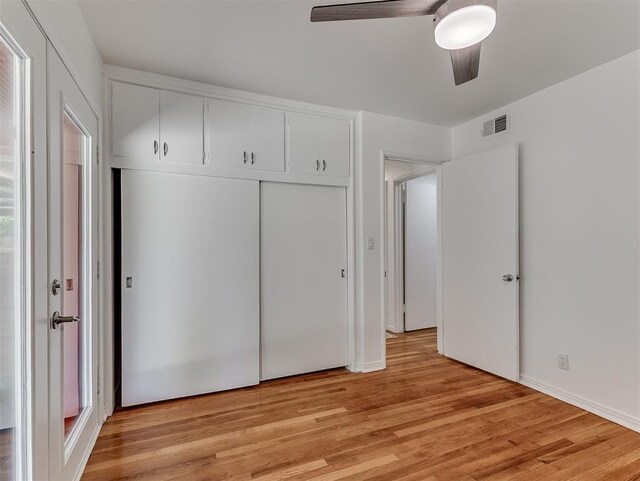 1738 Westchester Dr, Oklahoma City, OK 73120 - unfurnished bedroom with light wood finished floors, a closet, ceiling fan, and baseboards