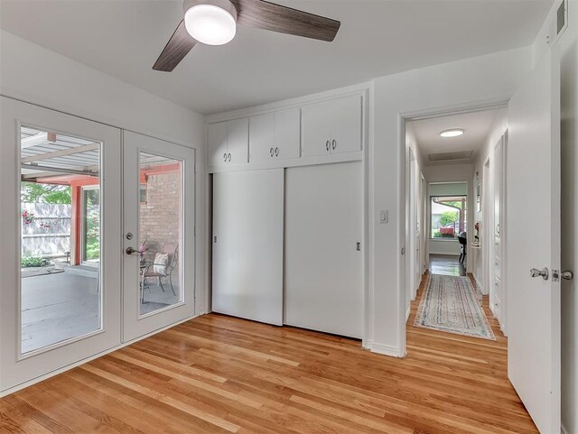 1738 Westchester Dr, Oklahoma City, OK 73120 - unfurnished bedroom with access to outside, french doors, light wood finished floors, ceiling fan, and a closet