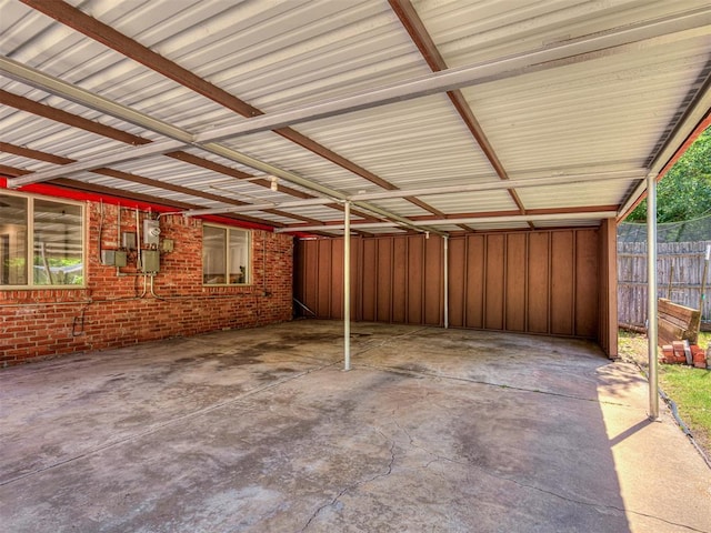 1738 Westchester Dr, Oklahoma City, OK 73120 - view of patio / terrace featuring fence and an attached carport