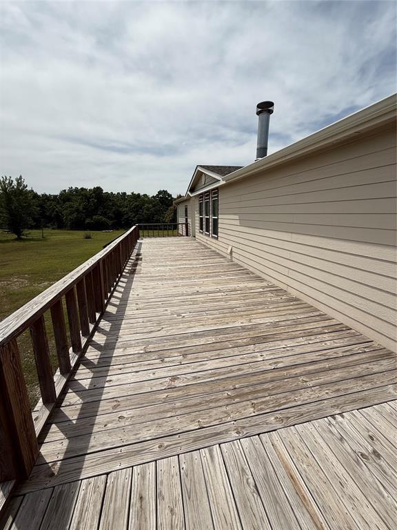 106 Sundown Ct, Mcloud, OK 74851 - view of wooden terrace