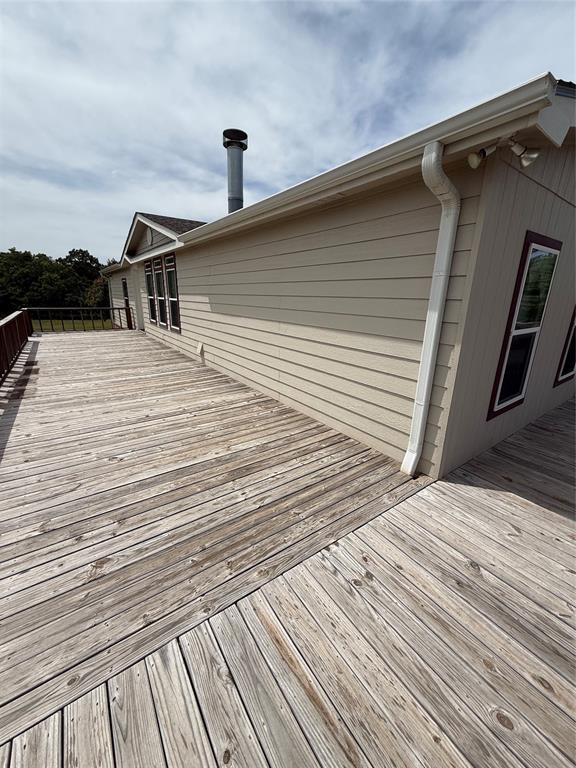 106 Sundown Ct, Mcloud, OK 74851 - view of wooden deck