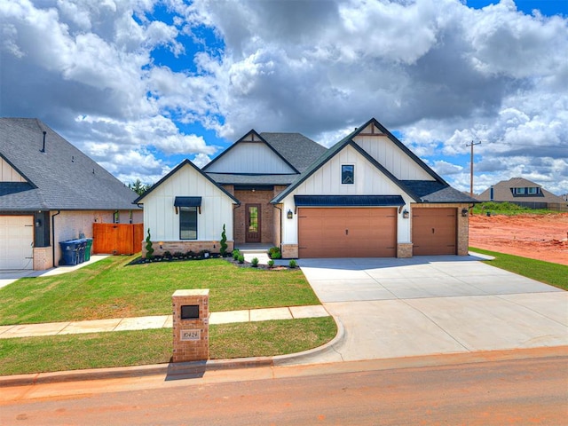 10424 SW 51st St, Mustang, OK 73064 - view of front of property with a garage, concrete driveway, roof with shingles, and board and batten siding