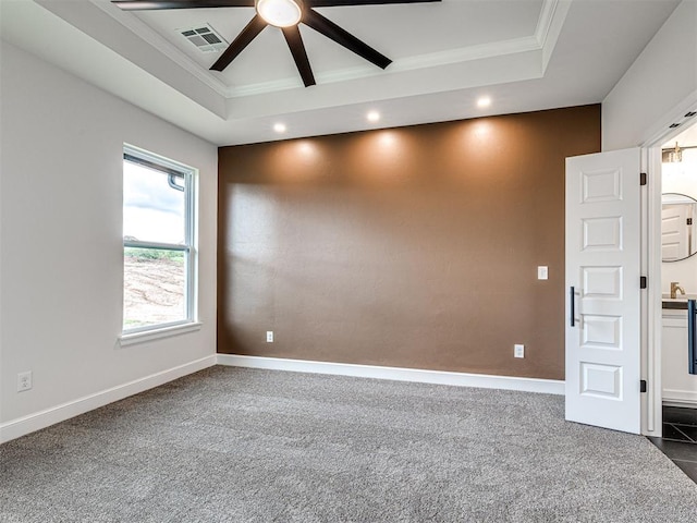 10424 SW 51st St, Mustang, OK 73064 - empty room with a tray ceiling, crown molding, a ceiling fan, recessed lighting, and baseboards