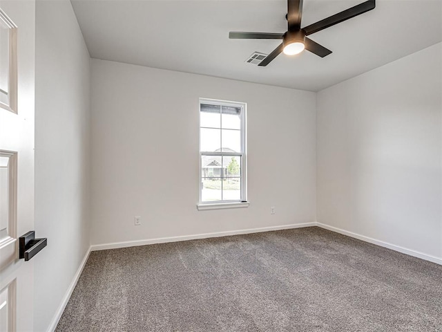 10424 SW 51st St, Mustang, OK 73064 - spare room with ceiling fan, carpet floors, and baseboards