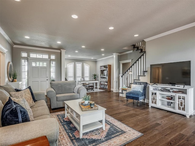 3605 Abbotsford, Norman, OK 73072 - living room featuring crown molding, stairs, dark wood-type flooring, recessed lighting, and decorative columns
