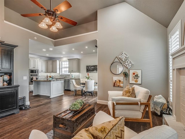 3605 Abbotsford, Norman, OK 73072 - living room featuring ceiling fan, dark wood finished floors, lofted ceiling, and recessed lighting