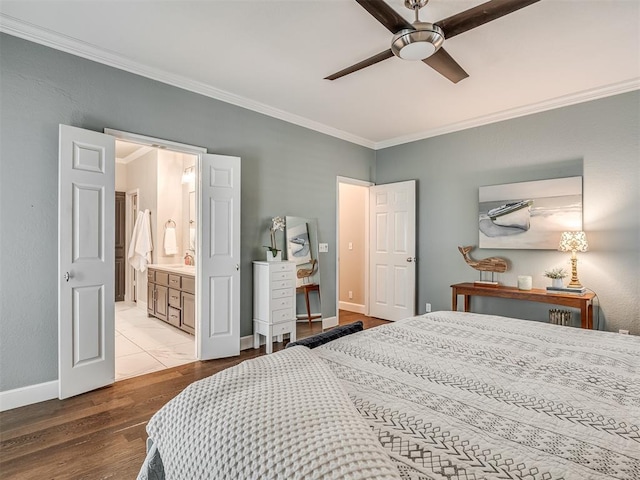 3605 Abbotsford, Norman, OK 73072 - bedroom with crown molding, baseboards, wood finished floors, connected bathroom, and ceiling fan