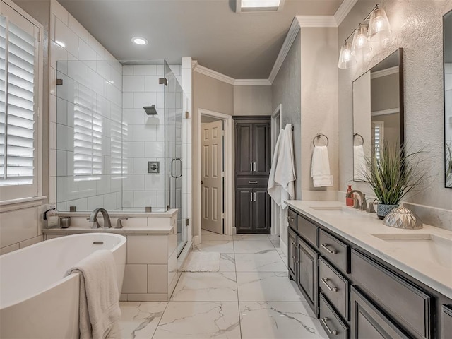 3605 Abbotsford, Norman, OK 73072 - bathroom with ornamental molding, a soaking tub, a stall shower, double vanity, and recessed lighting