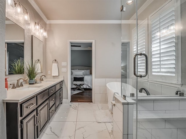 3605 Abbotsford, Norman, OK 73072 - full bath featuring crown molding, a freestanding tub, marble look tiles, double vanity, and ensuite bath