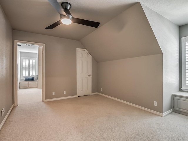 3605 Abbotsford, Norman, OK 73072 - bonus room featuring ceiling fan, light carpet, lofted ceiling, and baseboards