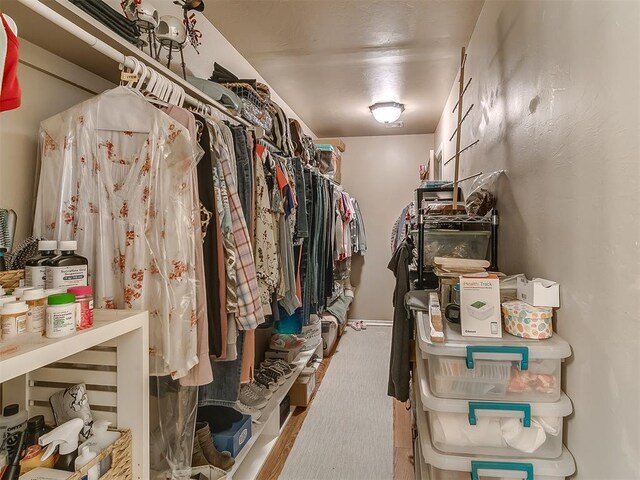 2536 Canyon Creek Dr, Yukon, OK 73099 - walk in closet featuring carpet flooring