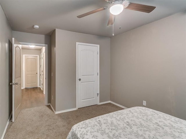 2536 Canyon Creek Dr, Yukon, OK 73099 - carpeted bedroom with baseboards and a ceiling fan