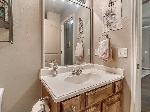 2536 Canyon Creek Dr, Yukon, OK 73099 - bathroom featuring vanity and wood finished floors