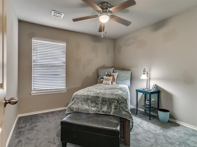 2536 Canyon Creek Dr, Yukon, OK 73099 - bedroom with carpet flooring, baseboards, and a ceiling fan