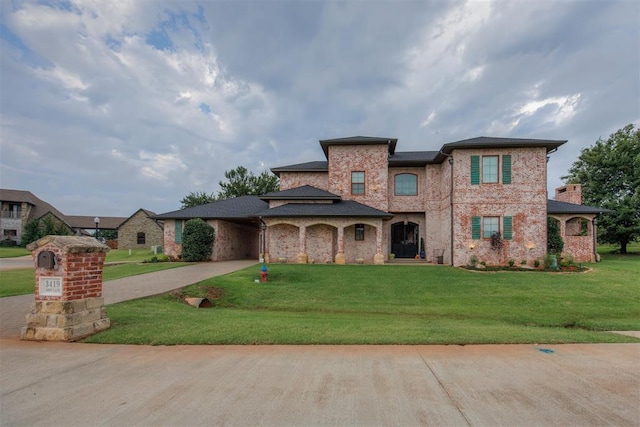 3419 Abby Ln, Newcastle, OK 73065 - view of front of home featuring concrete driveway, a front yard, and brick siding