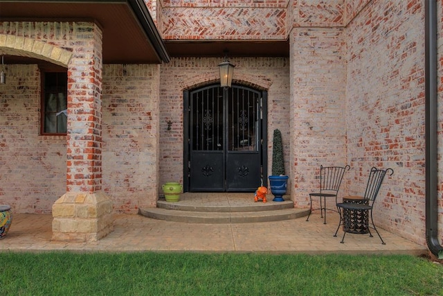 3419 Abby Ln, Newcastle, OK 73065 - view of exterior entry with brick siding and french doors