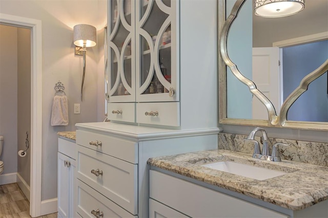 3419 Abby Ln, Newcastle, OK 73065 - bathroom featuring vanity, toilet, and baseboards