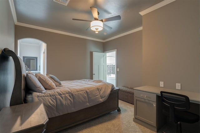 3419 Abby Ln, Newcastle, OK 73065 - bedroom with arched walkways, ornamental molding, light colored carpet, a ceiling fan, and a desk