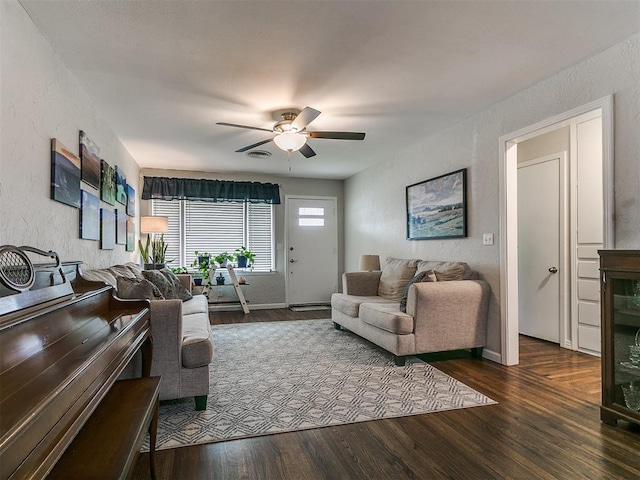 5001 N Independence Ave, Oklahoma City, OK 73112 - living room with a ceiling fan, wood finished floors, a textured wall, and baseboards