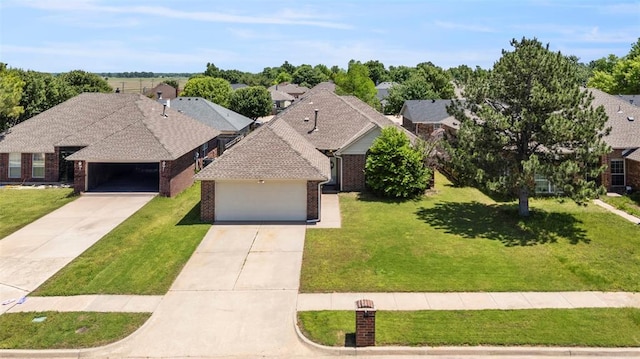 4917 Byron Cir, Yukon, OK 73099 - ranch-style house with brick siding, a front lawn, and driveway