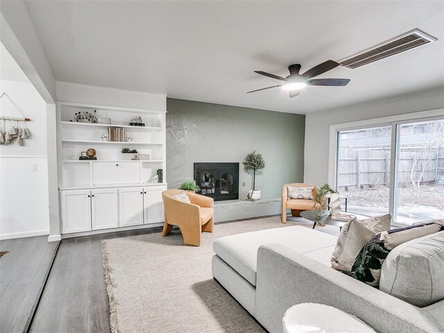 3325 NW 65th St, Oklahoma City, OK 73116 - living area with a ceiling fan and wood finished floors