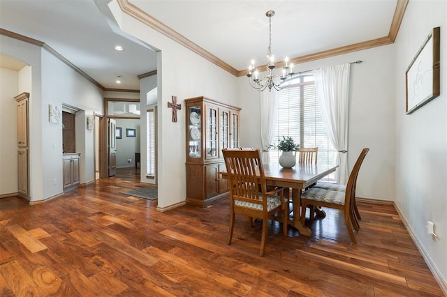 dining room with crown molding, a chandelier, dark wood-style floors, baseboards, and recessed lighting