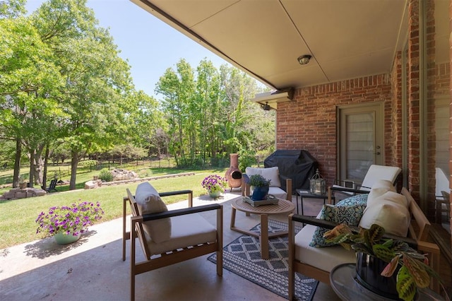 view of patio / terrace featuring area for grilling and outdoor lounge area