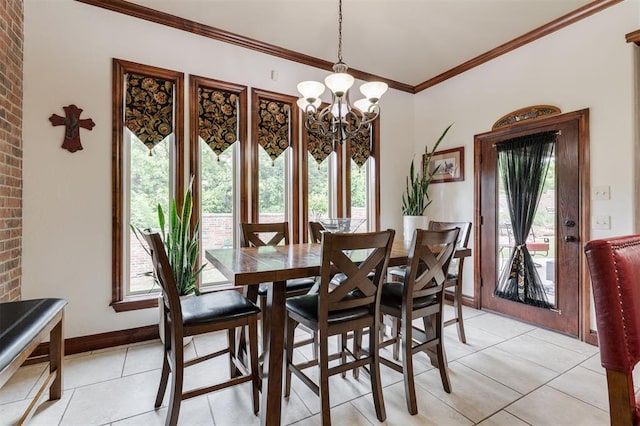 dining space with light tile patterned flooring, a chandelier, ornamental molding, and brick wall