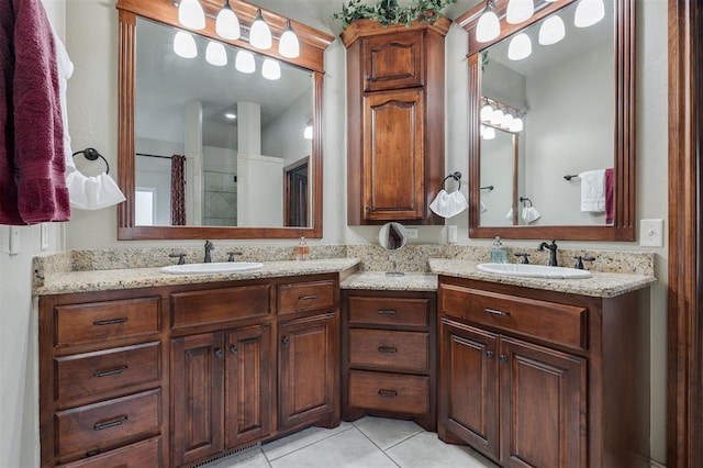 bathroom with tile patterned floors, vanity, and a shower with curtain