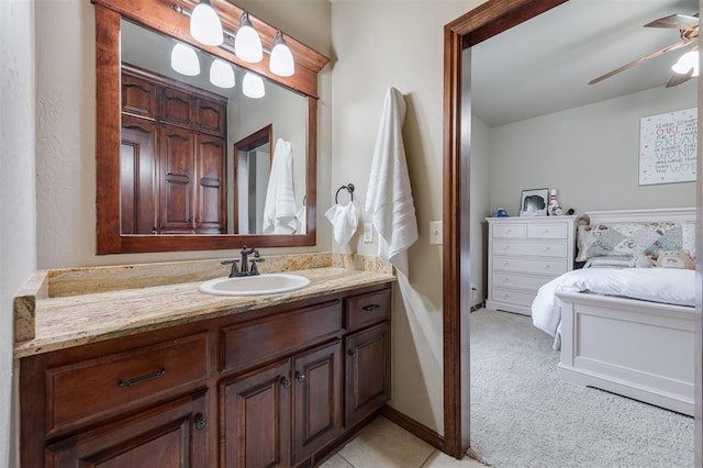 bathroom featuring a ceiling fan and vanity