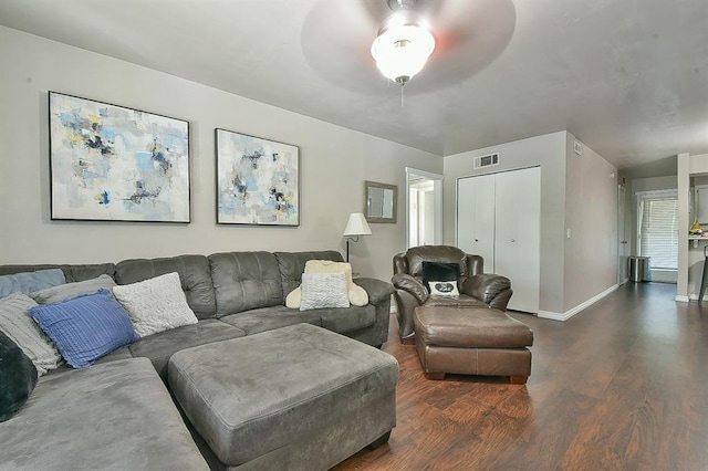 807 Cardinal Creek Blvd Unit C, Norman, OK 73072 - living room with dark wood-style floors, a ceiling fan, and baseboards