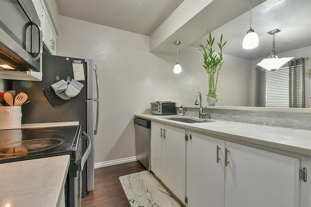 807 Cardinal Creek Blvd Unit C, Norman, OK 73072 - kitchen with a sink, dishwasher, electric range oven, dark wood finished floors, and white cabinets
