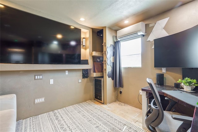office with a wall mounted AC and recessed lighting
