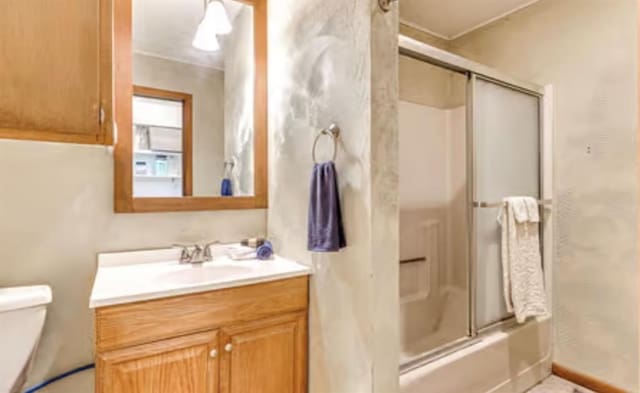 18906 13th St, Shawnee, OK 74801 - bathroom with combined bath / shower with glass door, vanity, and toilet
