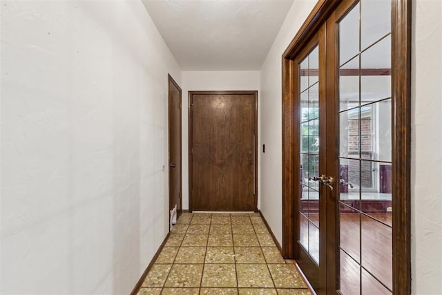 805 John F Kroutil Dr, Yukon, OK 73099 - entryway featuring french doors and baseboards