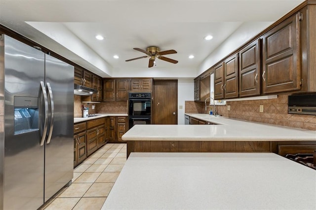 805 John F Kroutil Dr, Yukon, OK 73099 - kitchen with stainless steel refrigerator with ice dispenser, a sink, light tile patterned floors, tasteful backsplash, and light countertops