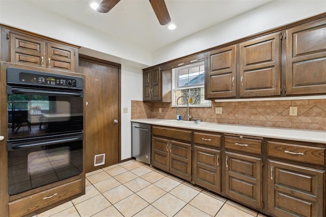 805 John F Kroutil Dr, Yukon, OK 73099 - kitchen featuring a sink, dishwasher, light countertops, and ceiling fan