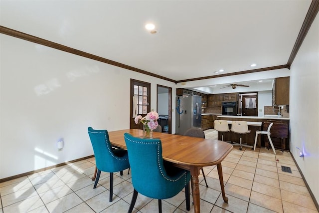 805 John F Kroutil Dr, Yukon, OK 73099 - dining area with crown molding, light tile patterned floors, baseboards, recessed lighting, and a ceiling fan
