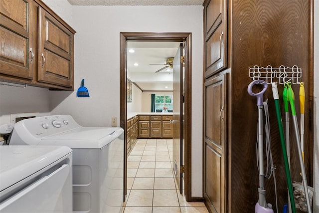 805 John F Kroutil Dr, Yukon, OK 73099 - washroom with cabinet space, separate washer and dryer, a ceiling fan, and light tile patterned floors