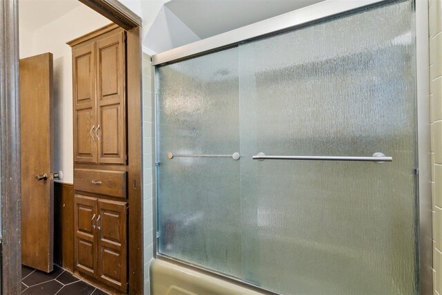 805 John F Kroutil Dr, Yukon, OK 73099 - full bath with bath / shower combo with glass door and tile patterned floors