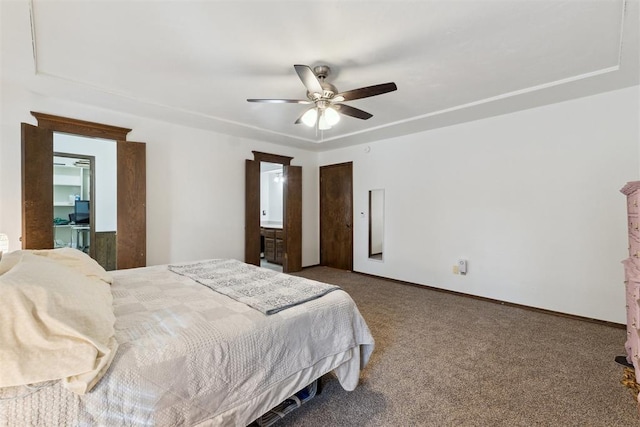 805 John F Kroutil Dr, Yukon, OK 73099 - carpeted bedroom with ceiling fan and baseboards