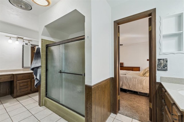 805 John F Kroutil Dr, Yukon, OK 73099 - ensuite bathroom with vanity, a stall shower, and tile patterned flooring