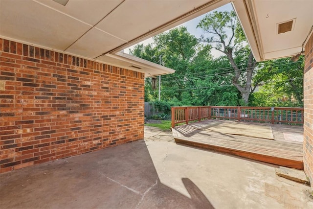 805 John F Kroutil Dr, Yukon, OK 73099 - view of patio / terrace with a wooden deck