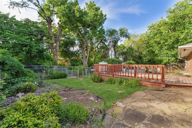 805 John F Kroutil Dr, Yukon, OK 73099 - view of yard with a wooden deck and view of wooded area