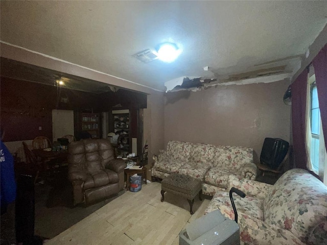 422 E Ash St, Lexington, OK 73051 - living area with wood finished floors
