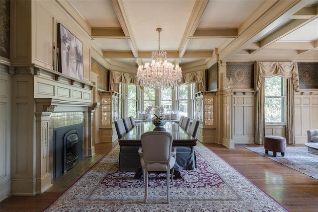 1415 N Hudson Ave, Oklahoma City, OK 73103 - dining area with a chandelier, a decorative wall, healthy amount of natural light, coffered ceiling, and wood finished floors